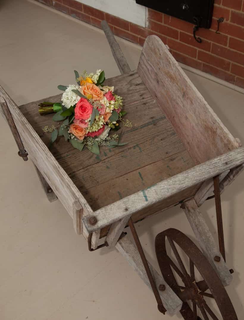 Wedding bouquet in wooden cart